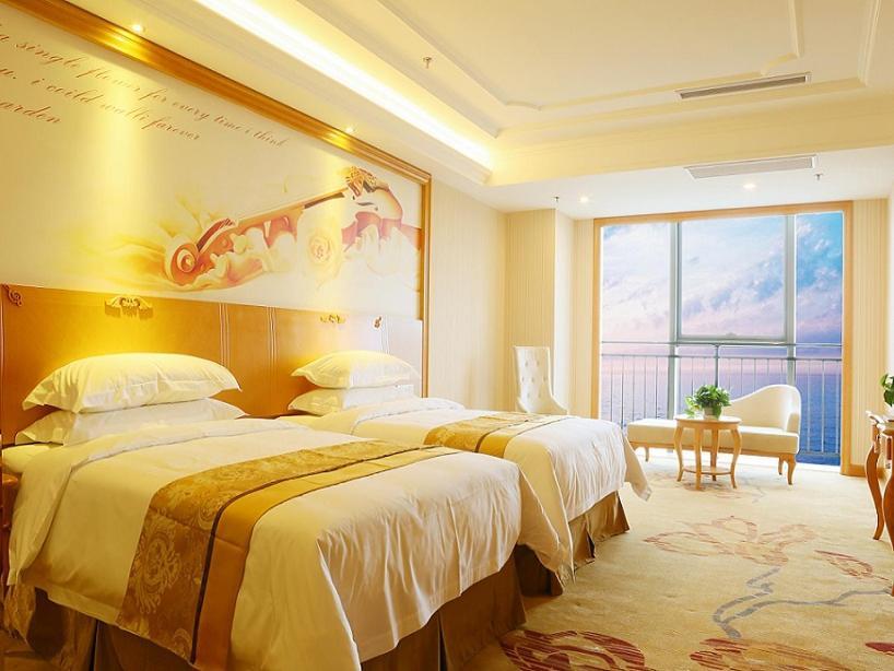 Vienna International Hotel Yantai Changjiang Road Xingyi Square Branch Exterior foto