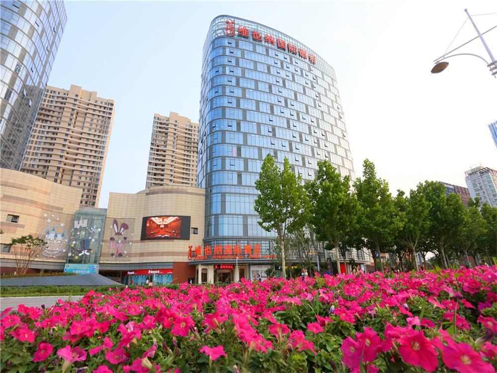 Vienna International Hotel Yantai Changjiang Road Xingyi Square Branch Exterior foto