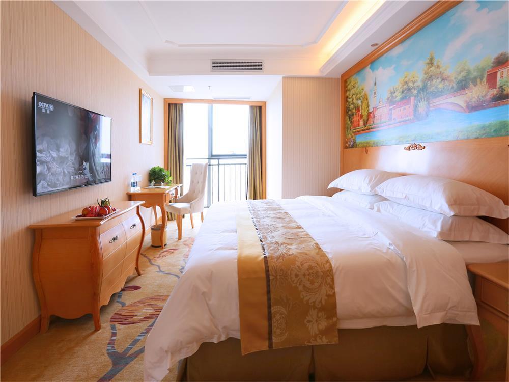 Vienna International Hotel Yantai Changjiang Road Xingyi Square Branch Exterior foto